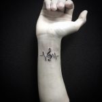 Music symbol tatoo